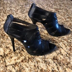 Black peep toe cutout heels with zipper